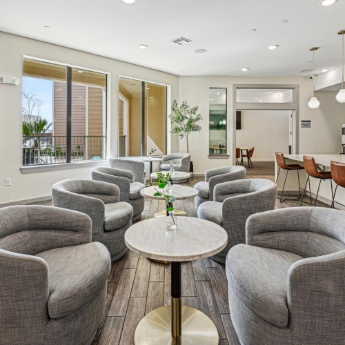 a large room with a table and chairs