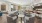 a large room with a table and chairs