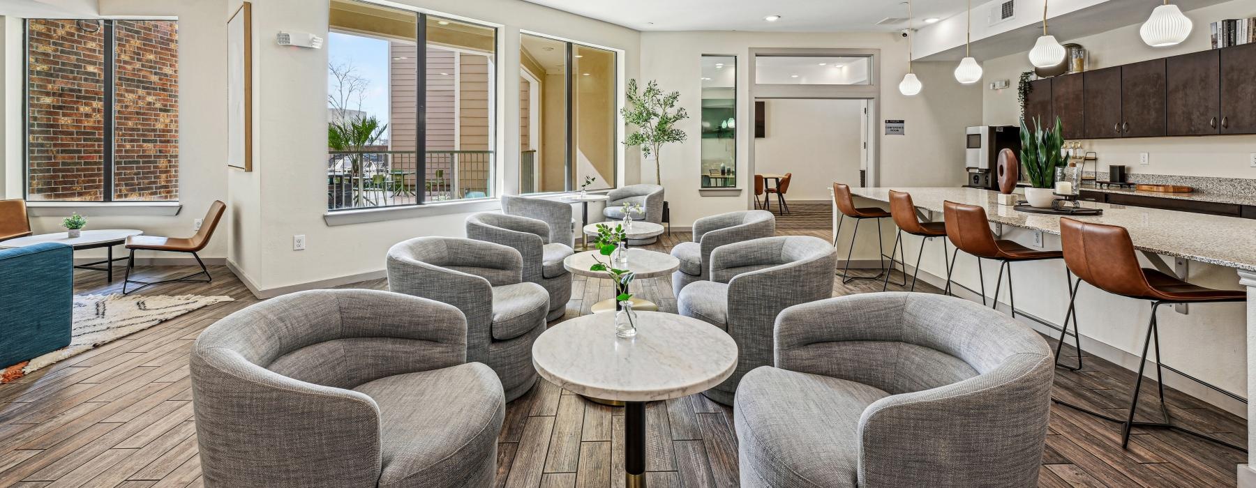 a large room with a table and chairs